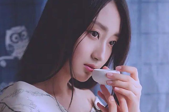 妩媚是什么意思啊？