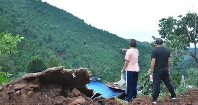 女子做了什么救下了21户村民?