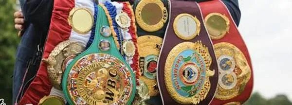 职业拳击金腰带，邹市明和熊朝忠谁得过的含金量大？