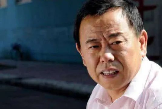 爷爷那年才十八 奶奶的花轿嫁是什么歌？